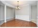 Bright dining room with hardwood floors and elegant chandelier at 4116 Briar Patch Ct., Myrtle Beach, SC 29579