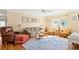 Living room with brown leather recliner and rattan furniture at 431 28Th St. S, Sunset Beach, NC 28468