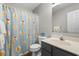 Clean bathroom with shower/tub and duck-themed decor at 4640 Greenbriar Dr. # C2, Little River, SC 29566