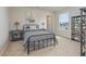 Cozy bedroom with a twin-size bed, nightstands, and a bookcase at 5004 Yellowstone Dr., Conway, SC 29526