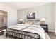 Serene bedroom featuring a metal bed frame and soft color scheme at 544 Duvall St., Longs, SC 29568