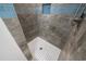 Clean shower with gray and blue tile at 6001 - 1081 S Kings Hwy., Myrtle Beach, SC 29575