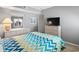 Bedroom with TV and dresser at 609 Hillside Dr. S # D-17, North Myrtle Beach, SC 29582