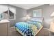 Cozy bedroom with a queen bed and tasteful decor at 609 Hillside Dr. S # D-17, North Myrtle Beach, SC 29582