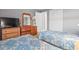 Bedroom with two twin beds and dresser at 609 Hillside Dr. S # D-17, North Myrtle Beach, SC 29582