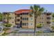 Two-story building with parking and palm trees at 609 Hillside Dr. S # D-17, North Myrtle Beach, SC 29582