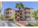 Two-story building with parking and palm trees at 609 Hillside Dr. S # D-17, North Myrtle Beach, SC 29582