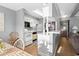 Efficient galley kitchen, white cabinetry, and modern appliances at 609 Hillside Dr. S # D-17, North Myrtle Beach, SC 29582