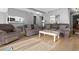 Living room with sectional sofa and wood floors at 609 Hillside Dr. S # D-17, North Myrtle Beach, SC 29582