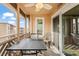 Private screened porch with seating and ocean views at 609 Hillside Dr. S # D-17, North Myrtle Beach, SC 29582