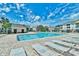 Inviting community pool with surrounding lounge chairs at 6203 Catalina Dr. # 1822, North Myrtle Beach, SC 29582