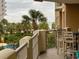 Partial ocean view from balcony with seating at 9994 Beach Club Dr. # 103, Myrtle Beach, SC 29572