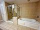 Bathroom boasts a shower and a relaxing jetted tub at 9994 Beach Club Dr. # 103, Myrtle Beach, SC 29572