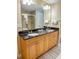 Elegant bathroom with double sinks and granite countertop at 9994 Beach Club Dr. # 103, Myrtle Beach, SC 29572