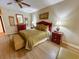 King bedroom with wood furniture and neutral decor at 9994 Beach Club Dr. # 103, Myrtle Beach, SC 29572