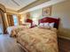 Guest bedroom with two double beds and balcony access at 9994 Beach Club Dr. # 103, Myrtle Beach, SC 29572