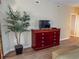 Bedroom with wood dresser and flat screen TV at 9994 Beach Club Dr. # 103, Myrtle Beach, SC 29572