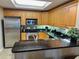 Modern kitchen with stainless steel appliances and granite countertops at 9994 Beach Club Dr. # 103, Myrtle Beach, SC 29572
