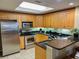 Modern kitchen with stainless steel appliances and granite countertops at 9994 Beach Club Dr. # 103, Myrtle Beach, SC 29572
