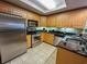 Modern kitchen with stainless steel appliances and granite countertops at 9994 Beach Club Dr. # 103, Myrtle Beach, SC 29572