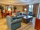 Bright living room with ample seating and hardwood floors at 9994 Beach Club Dr. # 103, Myrtle Beach, SC 29572
