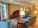 Bright living room with hardwood floors and comfy seating at 9994 Beach Club Dr. # 103, Myrtle Beach, SC 29572