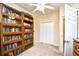 Sunlit office space with built-in wooden shelving and closet at 2660 Corn Pile Rd., Myrtle Beach, SC 29588