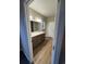 Bathroom with double vanity and wood-look floors at Tbb 20 Privetts Rd., Conway, SC 29526