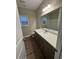 Bathroom with single vanity and window at Tbb 20 Privetts Rd., Conway, SC 29526