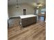 Island kitchen with stainless steel appliances and gray cabinets at Tbb 20 Privetts Rd., Conway, SC 29526