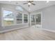 Sunroom with vaulted ceiling, windows, and sliding glass door at 1892 Blue Bird Rd., Loris, SC 29569