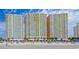 Three high-rise buildings overlooking a sandy beach at 2701 S Ocean Blvd. # 809, North Myrtle Beach, SC 29582