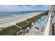 Aerial view of oceanfront property with pool and beach access at 2701 S Ocean Blvd. # 809, North Myrtle Beach, SC 29582