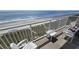Balcony with ocean view and seating for relaxing at 2701 S Ocean Blvd. # 809, North Myrtle Beach, SC 29582