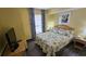 Bedroom with a queen bed and coastal decor at 2701 S Ocean Blvd. # 809, North Myrtle Beach, SC 29582
