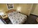 Cozy bedroom with seashell bedding and ocean view art at 2701 S Ocean Blvd. # 809, North Myrtle Beach, SC 29582