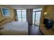 Bedroom with ocean view and king-size bed at 2701 S Ocean Blvd. # 809, North Myrtle Beach, SC 29582