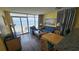 Living room with ocean view, balcony access, and seating area at 2701 S Ocean Blvd. # 809, North Myrtle Beach, SC 29582