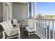 Relaxing balcony overlooking the lake with seating at 4519 N Plantation Dr. # X-9, Little River, SC 29566