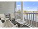 Relaxing balcony with lake view and seating at 4519 N Plantation Dr. # X-9, Little River, SC 29566