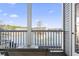 Screened balcony overlooking a lake with fountain at 4519 N Plantation Dr. # X-9, Little River, SC 29566