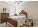 Bedroom with antique wooden bed and built-in dresser at 4519 N Plantation Dr. # X-9, Little River, SC 29566