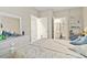 Bedroom with white dresser and access to bathroom at 4519 N Plantation Dr. # X-9, Little River, SC 29566