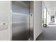 Stainless steel elevator in building hallway at 4519 N Plantation Dr. # X-9, Little River, SC 29566