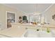 Kitchen with a breakfast bar and view into living room at 4519 N Plantation Dr. # X-9, Little River, SC 29566