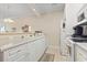 Kitchen features white cabinets, a breakfast bar, and appliances at 4519 N Plantation Dr. # X-9, Little River, SC 29566