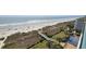 Aerial view showing beach, boardwalk, and pool at 501 S Ocean Blvd. # 601, North Myrtle Beach, SC 29582