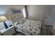 Guest bedroom with seashell bedding and ocean decor at 501 S Ocean Blvd. # 601, North Myrtle Beach, SC 29582
