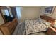 Bedroom with a queen bed, dresser, and TV at 501 S Ocean Blvd. # 601, North Myrtle Beach, SC 29582