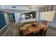 Dining area with wooden table and chairs at 501 S Ocean Blvd. # 601, North Myrtle Beach, SC 29582